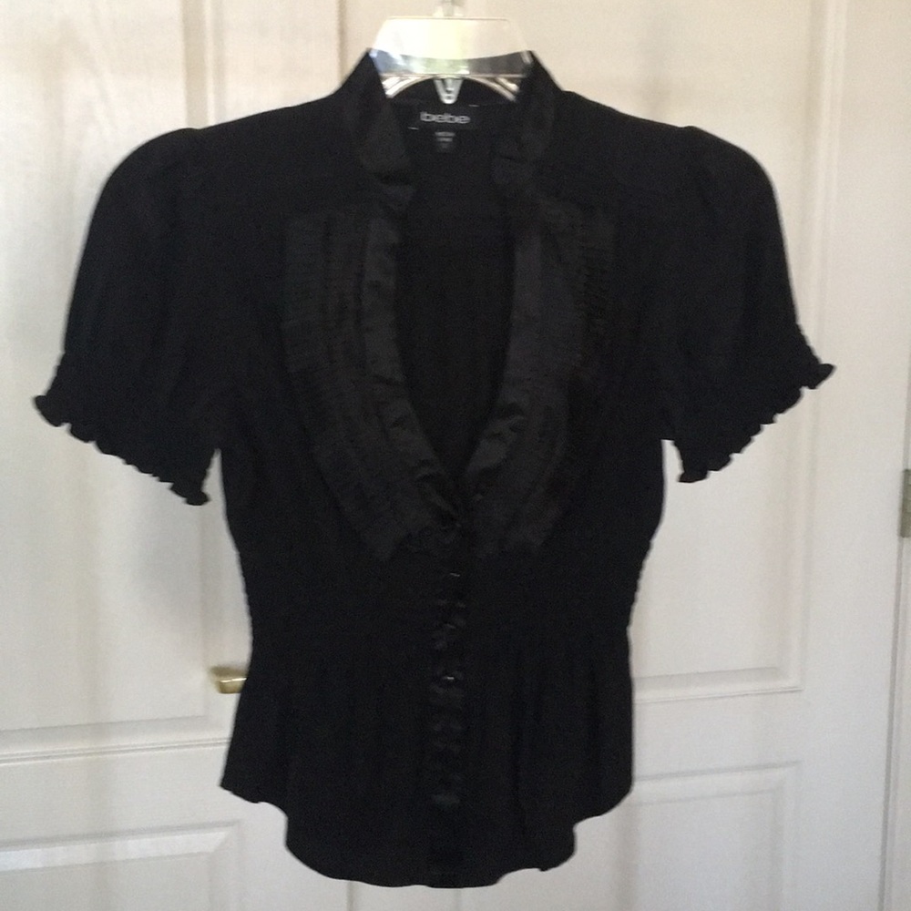 Bebe ruffled silk (96%) blouse.